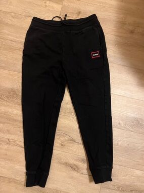 HUGO Black Joggers with Red Logo Patch